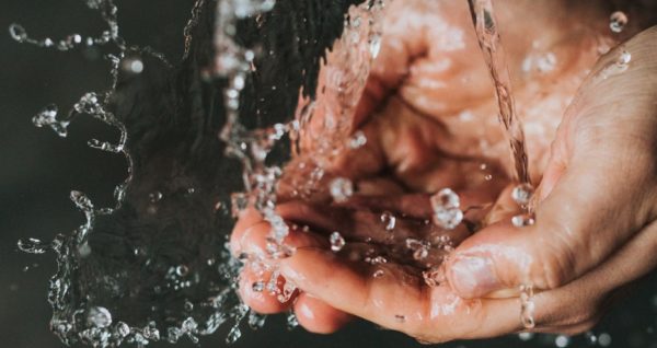 Running water on hands