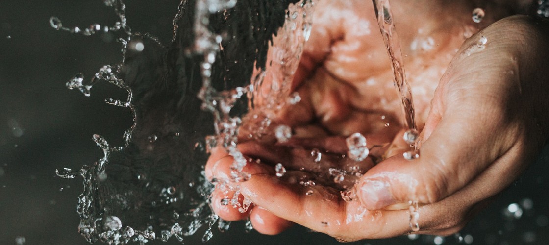 Running water on hands